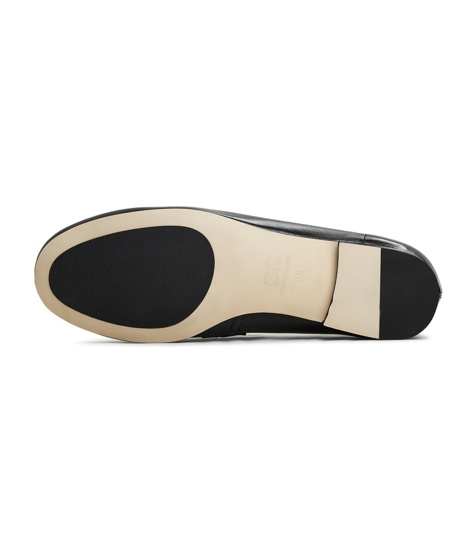 A stylish pair of women's block heeled Diana loafers in black, perfect for fall fashion.