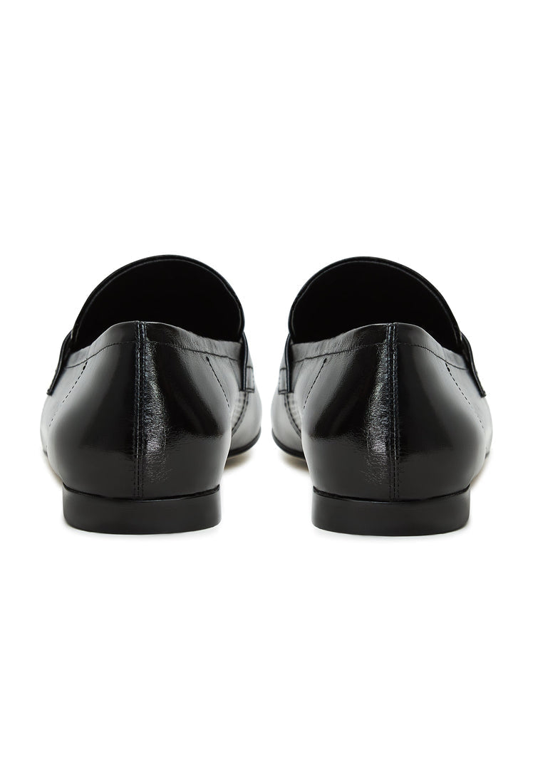 A stylish pair of black Diana block heeled loafers for women, perfect for fall fashion.