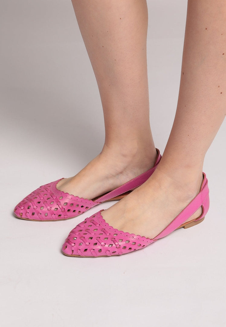 A stylish pair of pink leather ballerinas - women's ballet flats featuring intricate leather cut detailing for a chic and comfortable look.