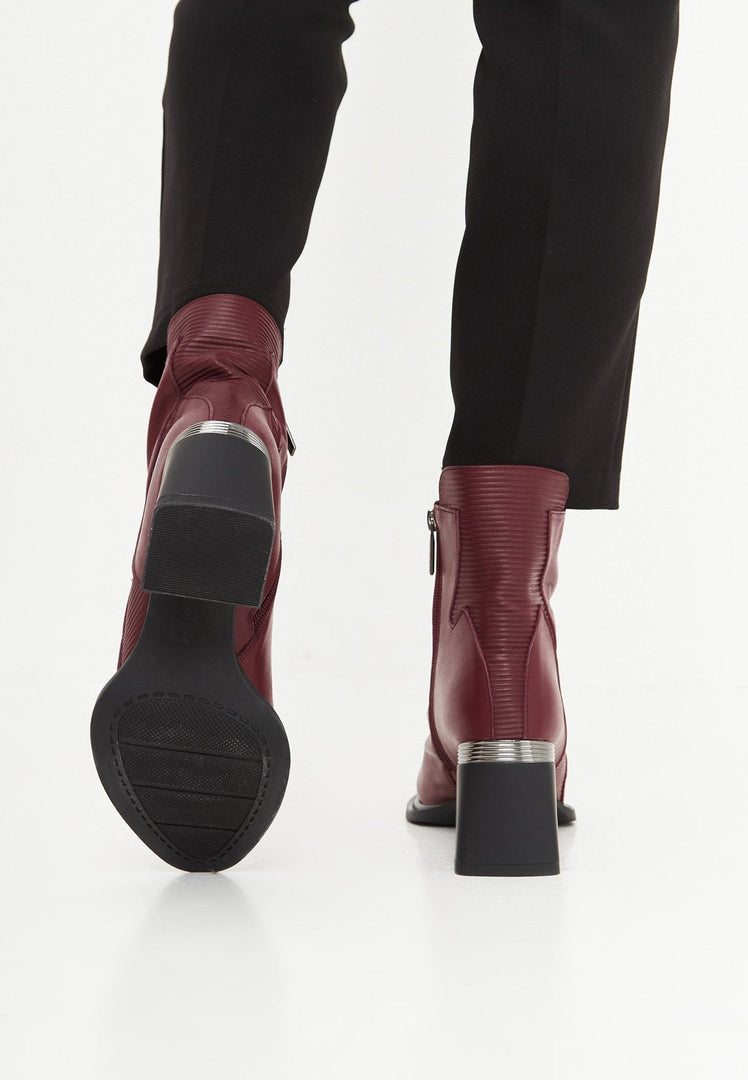A pair of trendy block heel ankle boots in Bordeaux, perfect for fall fashion and stylish women.