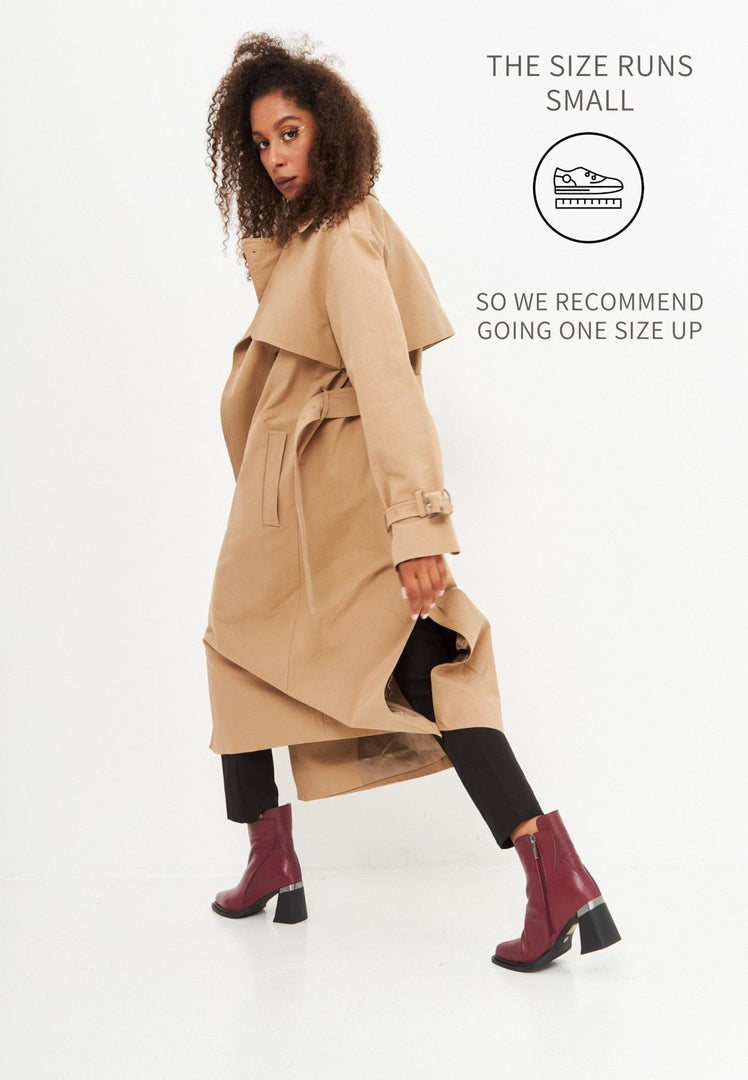 A stylish pair of Bordeaux block heel ankle boots - perfect for fall fashion. These trendy ankle boots for women are a must-have this season.