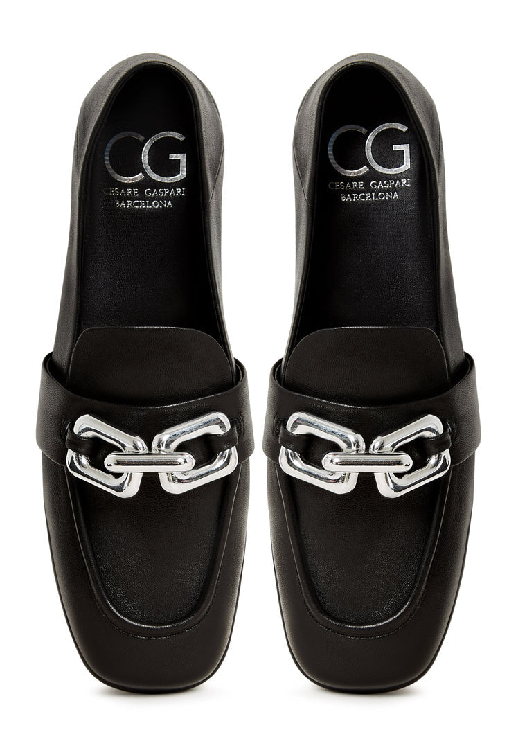 A stylish pair of Valeria black platform loafers for women, perfect for adding a chic touch to any outfit.