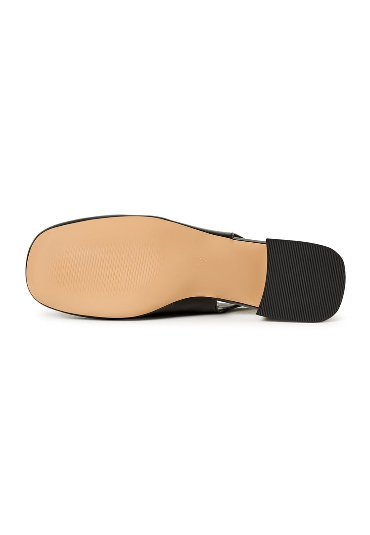 A stylish and sophisticated pair of black slingback pumps, the Irina slingback pumps, perfect for any elegant outfit with their sleek design, making them a must-have for women who love designer slingback shoes.