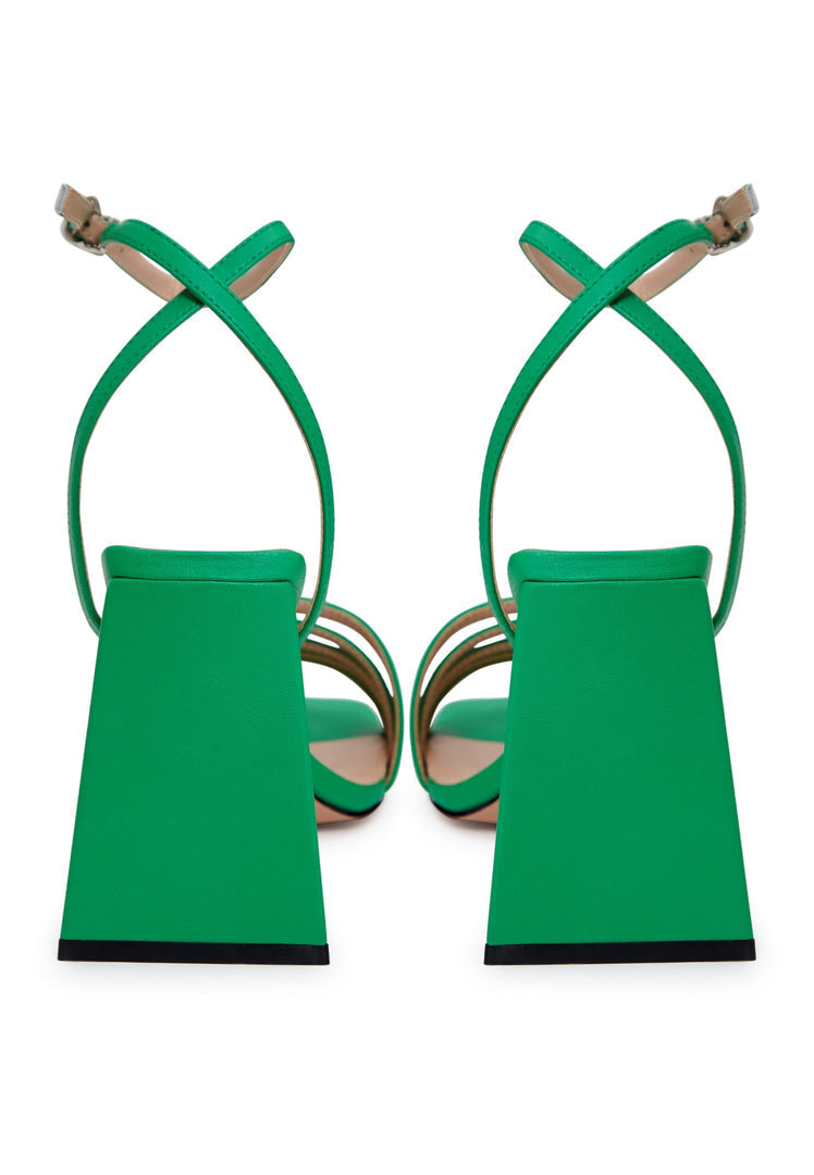A pair of trendy green chunky comfort sandals, perfect for summer outings and comfortable footwear enthusiasts.