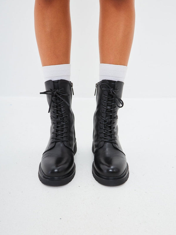 Botines casuales de piel con tacón en bloque