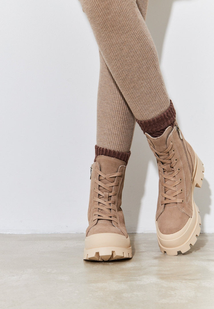 A stylish urban lace-up ankle boots, perfect for trendy ankle booties enthusiasts looking for chic and fashionable street style footwear.