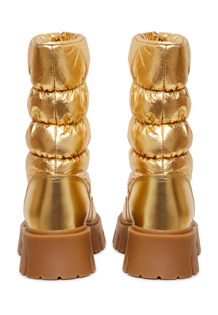 Stay stylish and warm this season with these chic gold winter boots, the perfect addition to elevate your winter fashion trends!