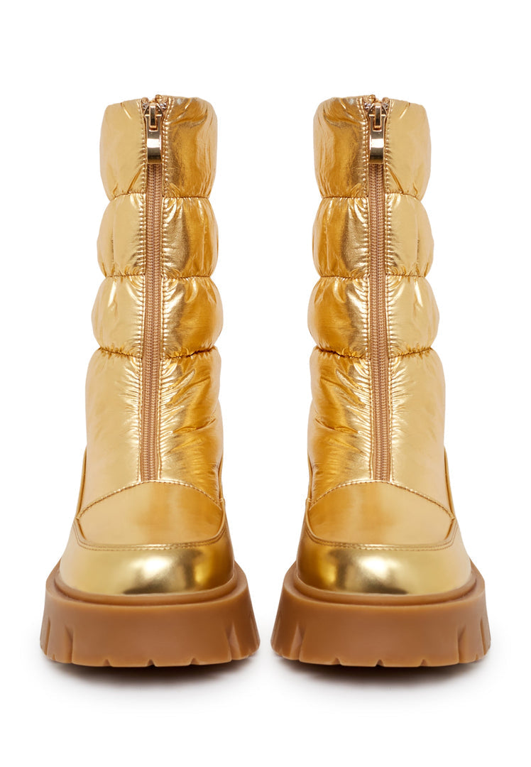 Stay stylish in the winter with these cozy chic gold boots - the perfect fashion footwear to keep up with the winter fashion trends.
