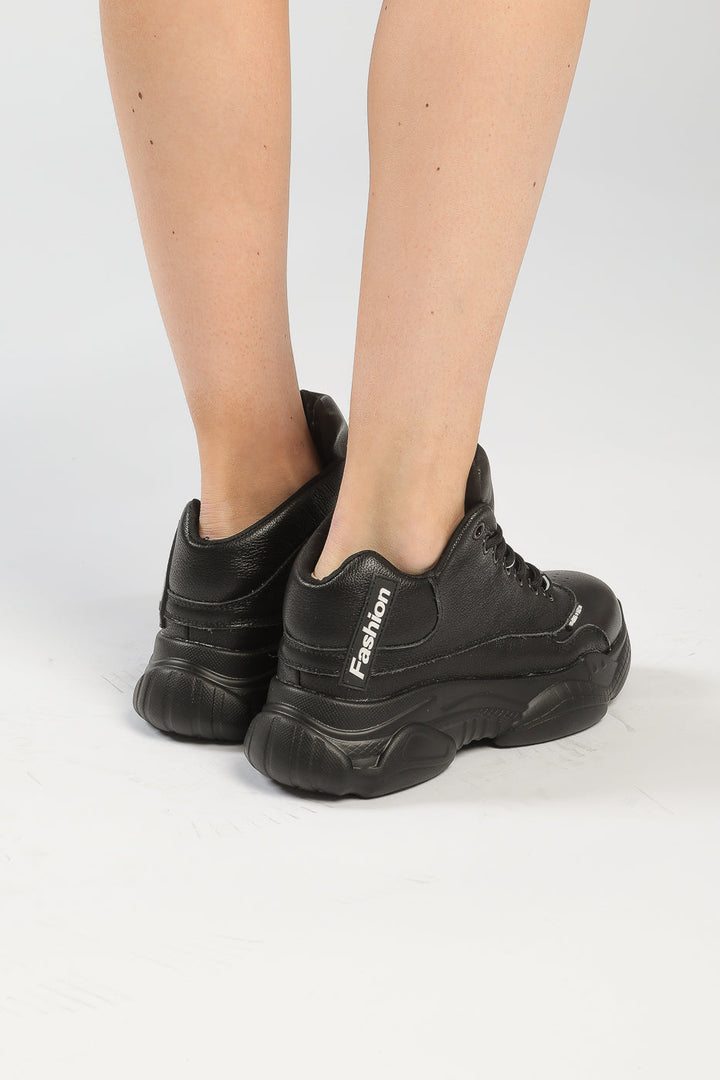 Baskets montantes monochromes à gros talons