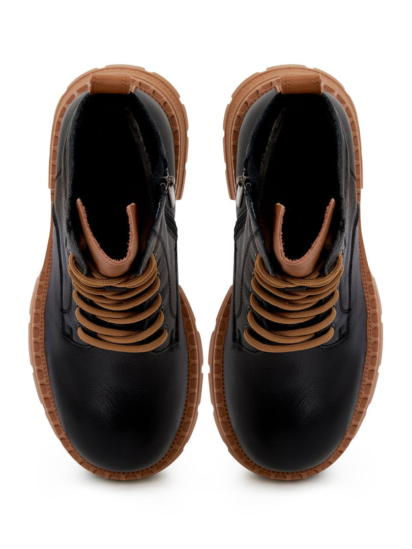 A pair of stylish black leather lace-up ankle boots for women, perfect for adding a fashion-forward touch to any outfit.