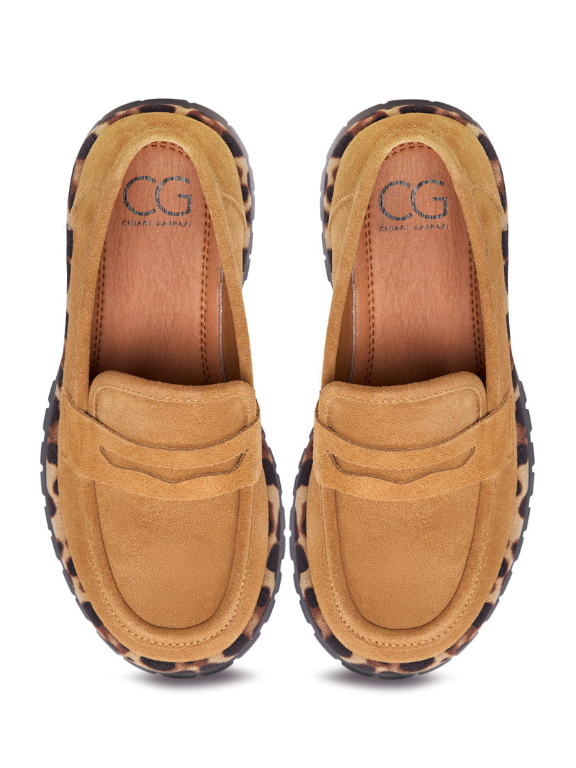 A stylish pair of Lily brown chic loafers with a chunky sole, perfect for women's fashion footwear, a trendy addition to your collection.