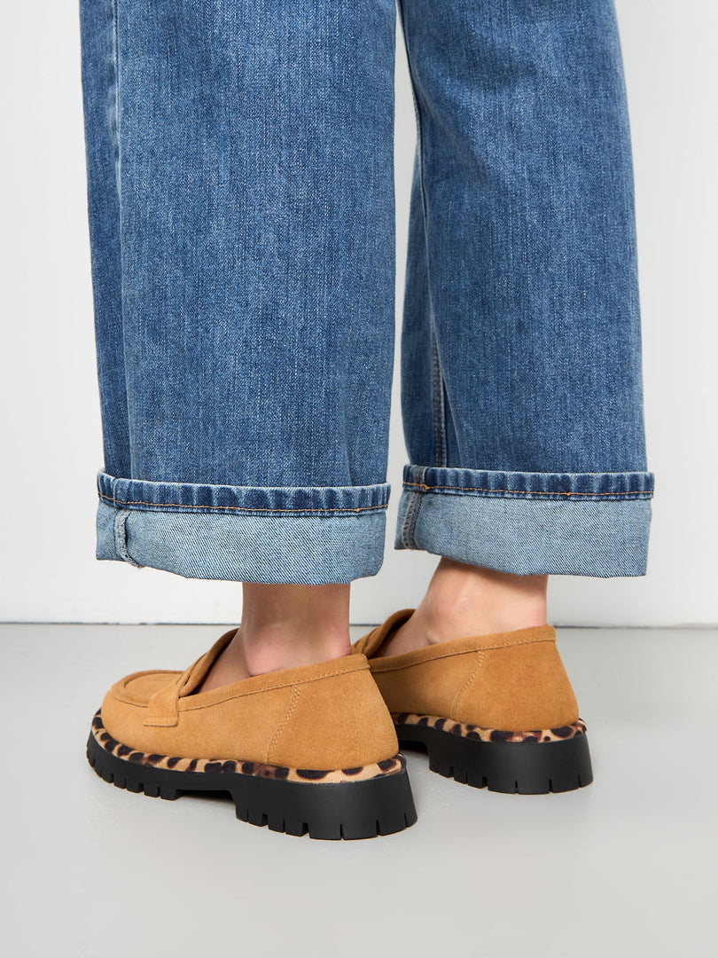 A stylish pair of chic Lily brown loafers with a chunky sole, ideal for women's fashion footwear, for a trendy and fashionable look.