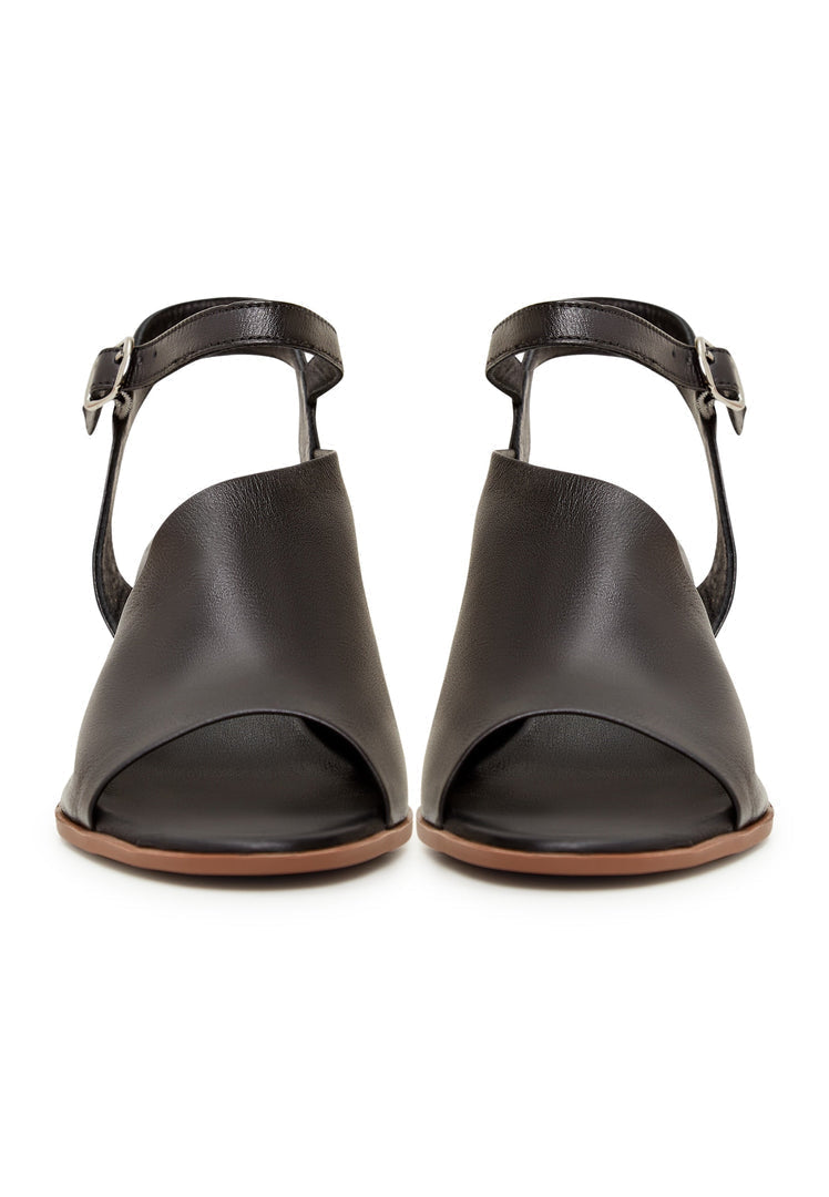 A stylish pair of black leather block heel sandals, perfect for adding a touch of sophistication to any outfit.