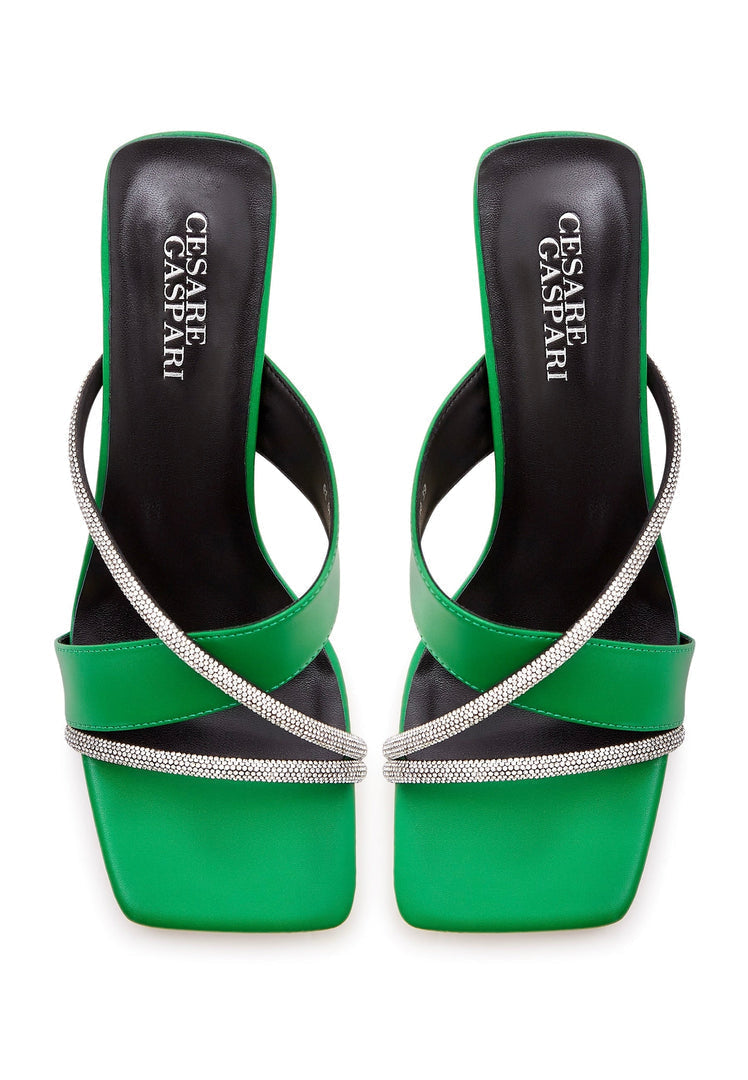 A stylish pair of green women's high heels sandals with strappy design, perfect for adding a fashionable touch to any outfit.