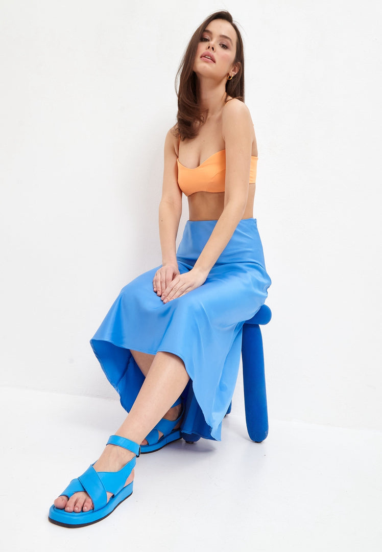 A stylish pair of women's blue leather platform sandals with a trendy wedge design.
