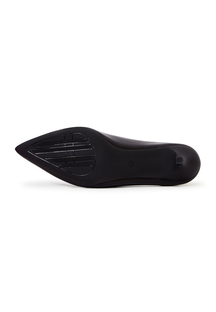 A pair of elegant luxe black pumps, a symbol of luxury footwear and designer heels, offering classic style.