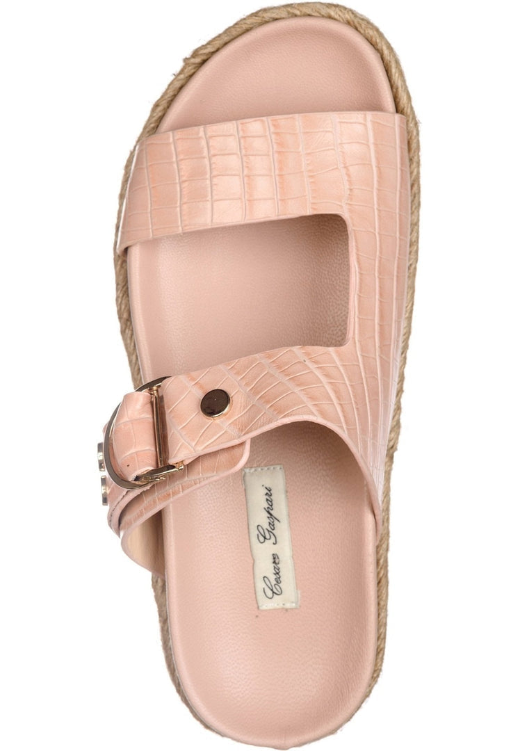 A trendy pair of beige buckle strap slide sandals for women, perfect for staying stylish and comfortable in the latest summer fashion trends.
