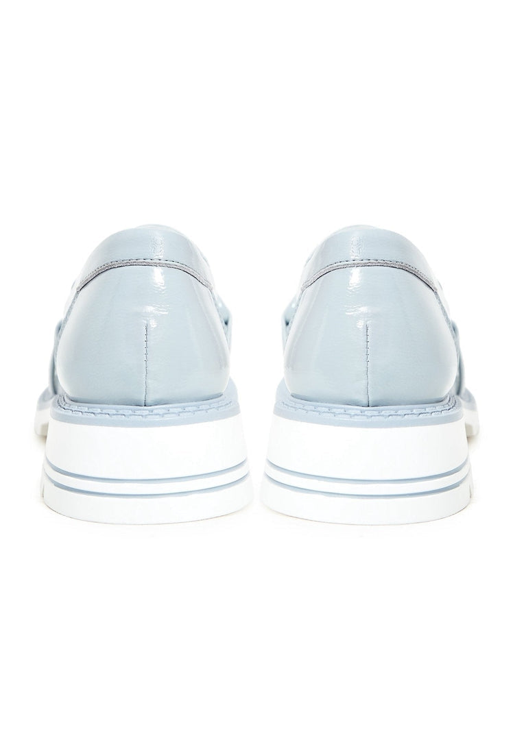 A stylish pair of women's blue block heels loafers, perfect for your fashion-forward wardrobe.