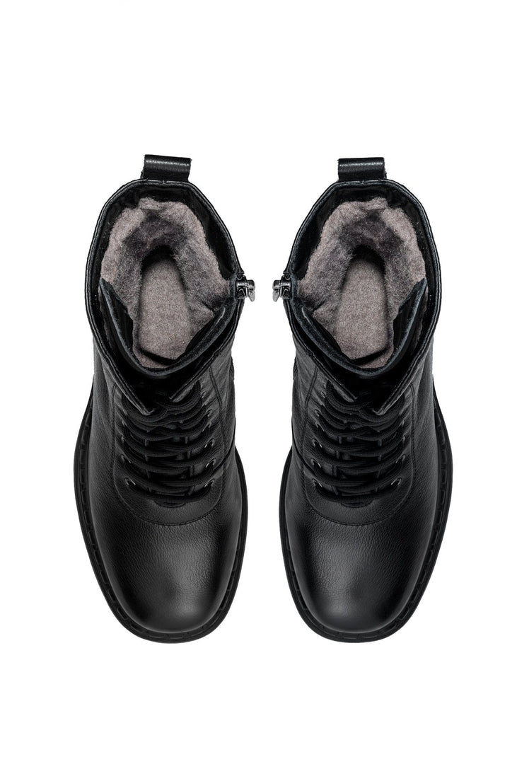 A pair of stylish and classic block heeled winter boots with cozy wool insoles for women's fashion.