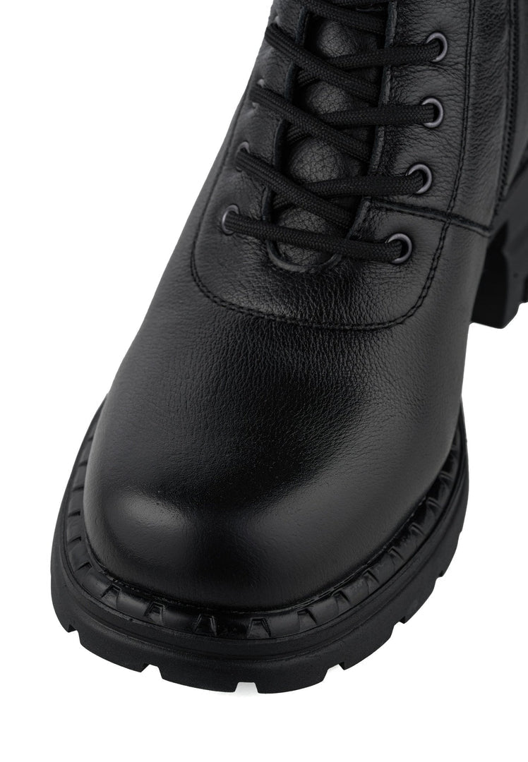 A stylish pair of block heeled classic boots with wool insoles, perfect as heeled winter boots for women's fashion.