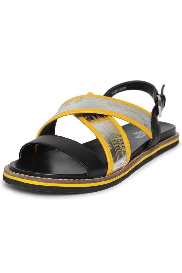 A pair of stylish urban leather sandals with flat soles, perfect for adding a touch of sophistication to your outfit.