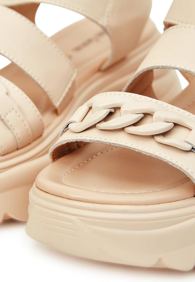 A pair of stylish leather platform heeled sandals for women.