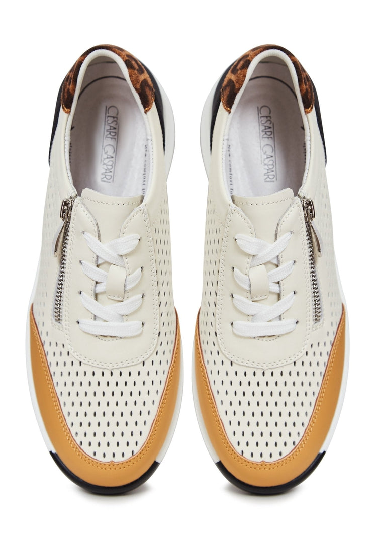 A stylish pair of brown leather platform sneakers for women, the perfect fashionable and trendy footwear.