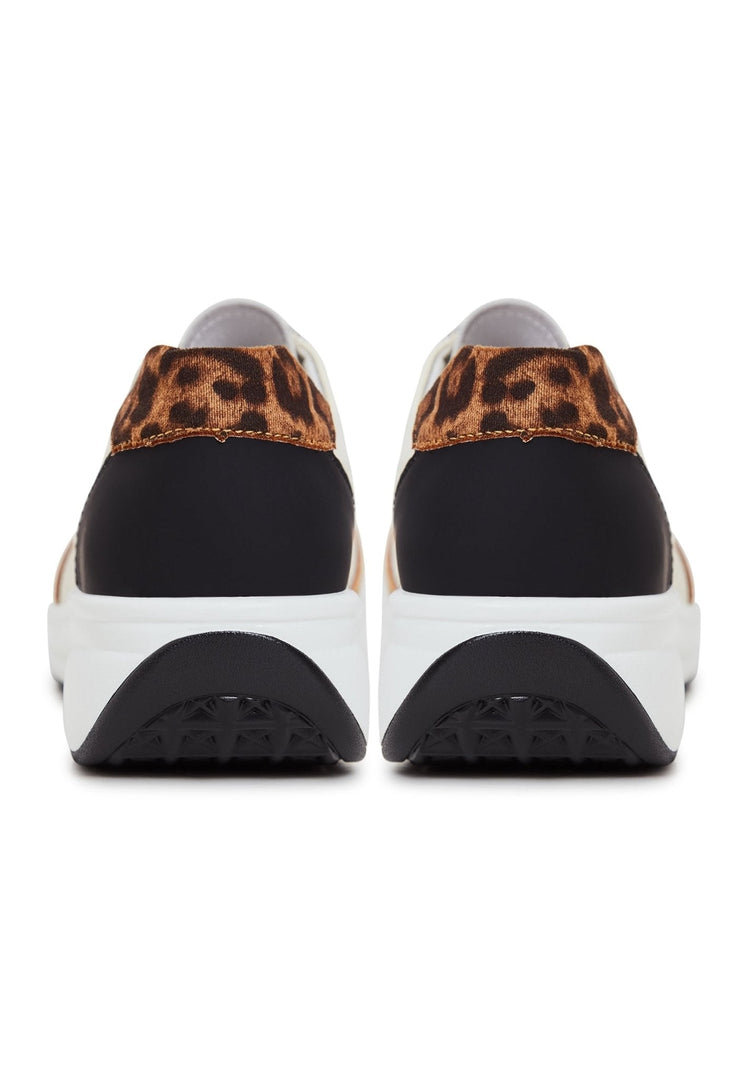 A trendy pair of women's brown platform leather sneakers, perfect for fashionable footwear enthusiasts.