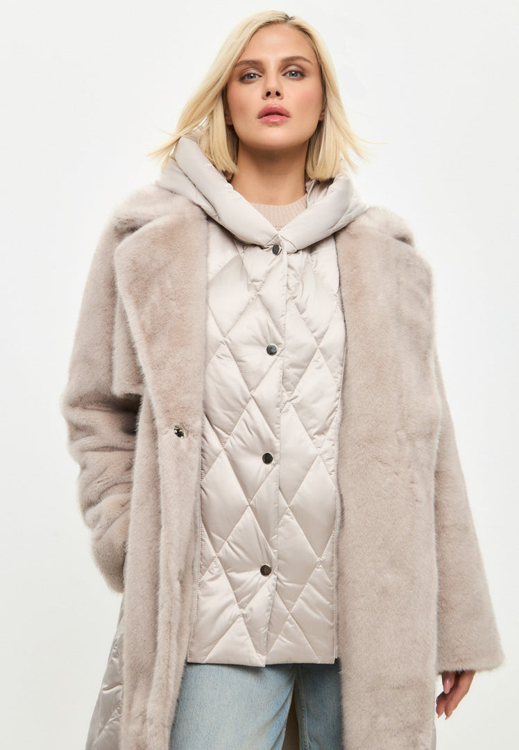 A stylish and chic women's winter outerwear piece featuring a quilted faux fur coat with pearl embellishments, a belted design, perfect for staying cozy and fashionable in the colder months.