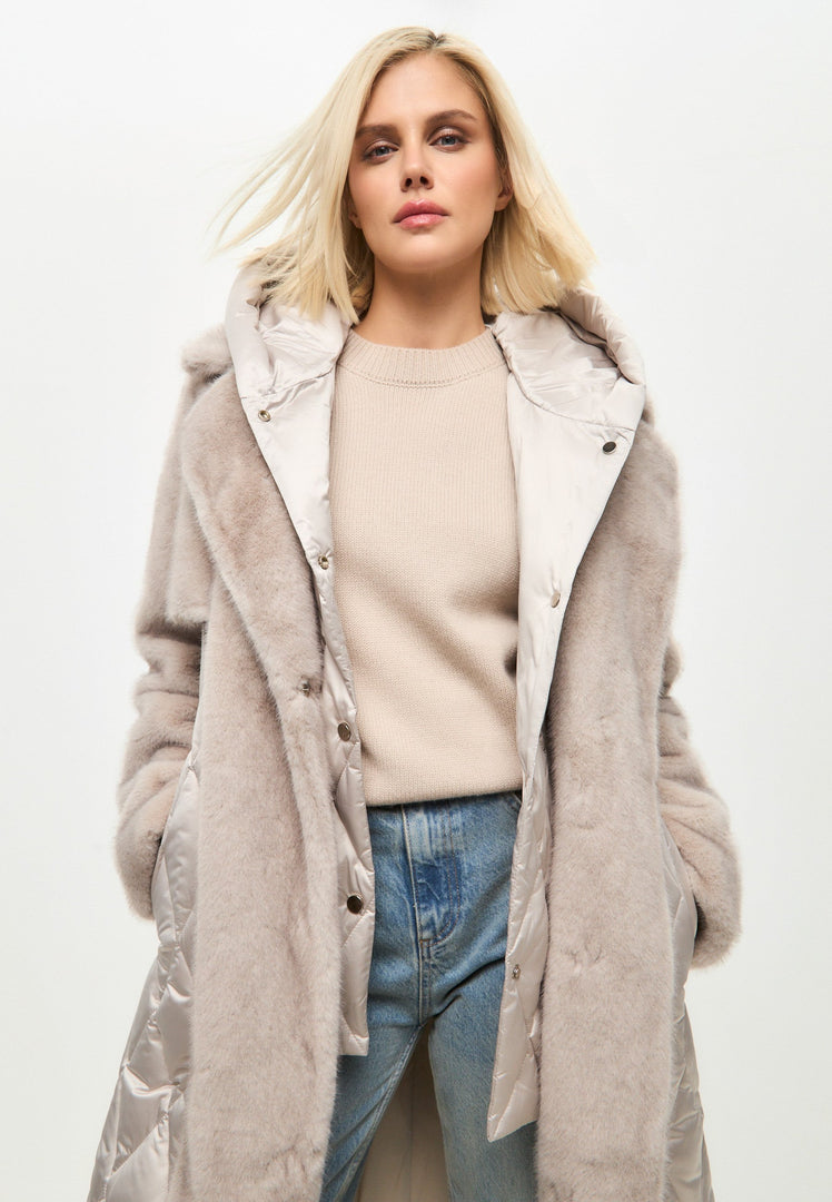 A stylish quilted faux fur coat with pearl embellishments, perfect for women's winter outerwear. This belted chic winter coat is sure to keep you warm and on-trend.