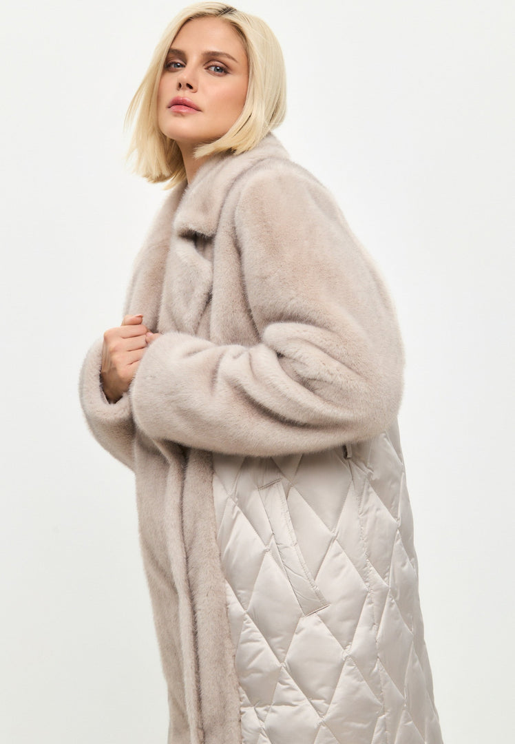 A stylish and cozy quilted faux fur coat with pearl embellishments, perfect for women's winter outerwear. This chic winter coat features a belted waist for a flattering fit.