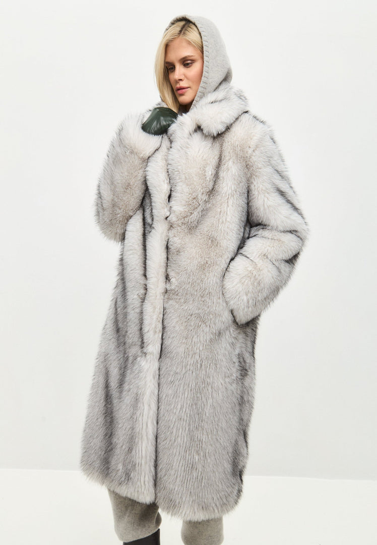 Stay warm and stylish this winter with a luxurious gray faux fur coat, the perfect women's faux fur jacket for your winter fashion wardrobe.