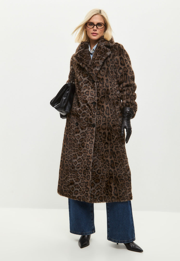 A trendy reversible faux shearling animal print coat, perfect for staying warm and stylish in the winter months.