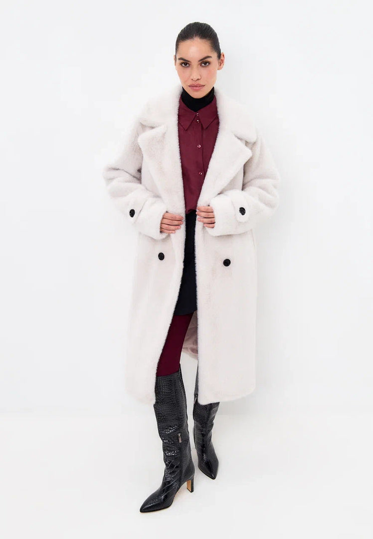 A stylish winter fashion Miriam coat in white, featuring double buttons and faux fur detailing.