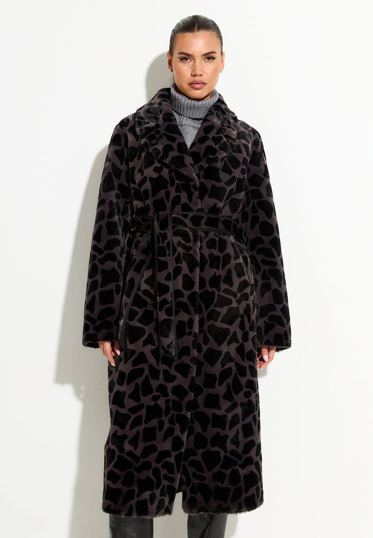 A stylish reversible animal print coat with faux black fur lining, perfect for staying warm and on-trend this winter.