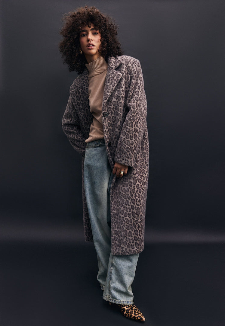 A trendy and fashion-forward Bianca faux fur leopard print long coat, perfect for making a statement this season.