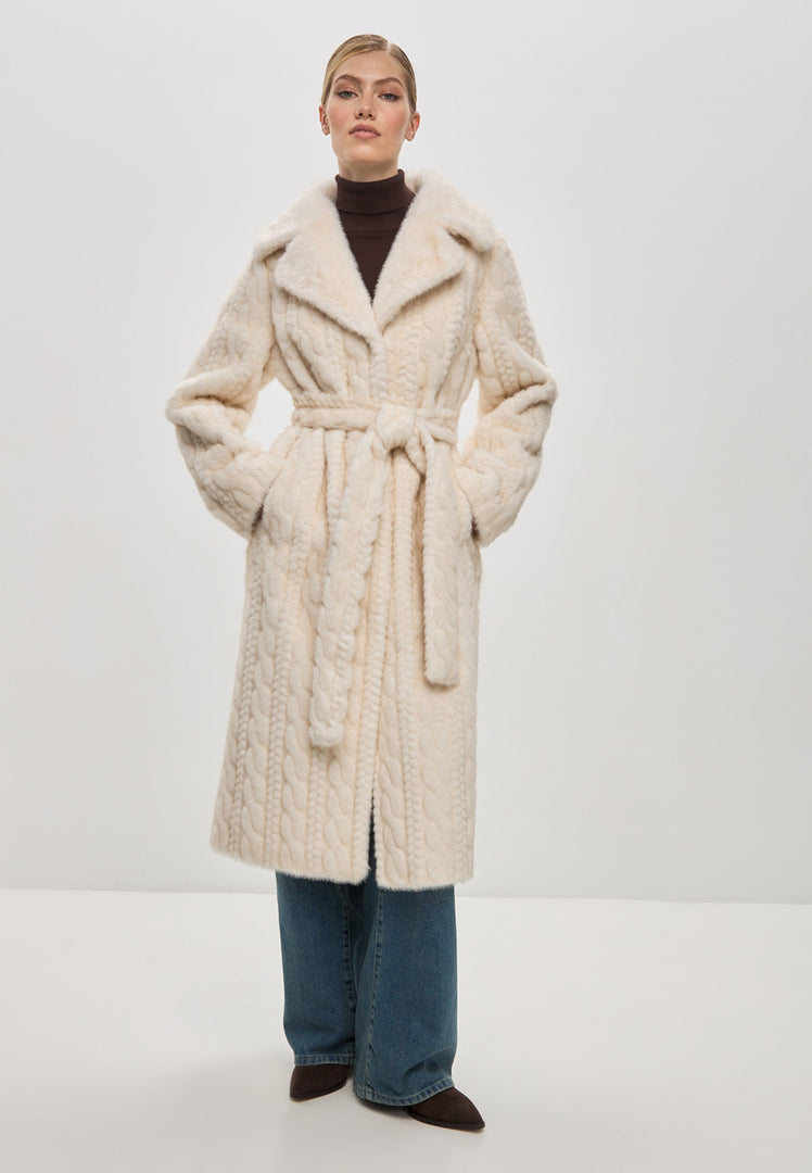 Stay warm and chic with this elegant cream cable knit coat featuring faux fur details. Perfect for the cold season, this stylish knit fur jacket is a must-have for your winter wardrobe.