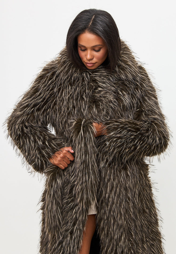 A stylish and luxurious brown faux fur coat by a high-end North designer.