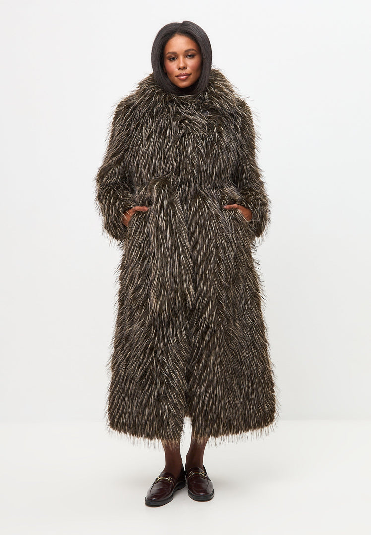 A stylish and elegant brown faux fur coat, the epitome of luxury and high-end designer fashion, perfect for a fashion-forward look in colder climates.