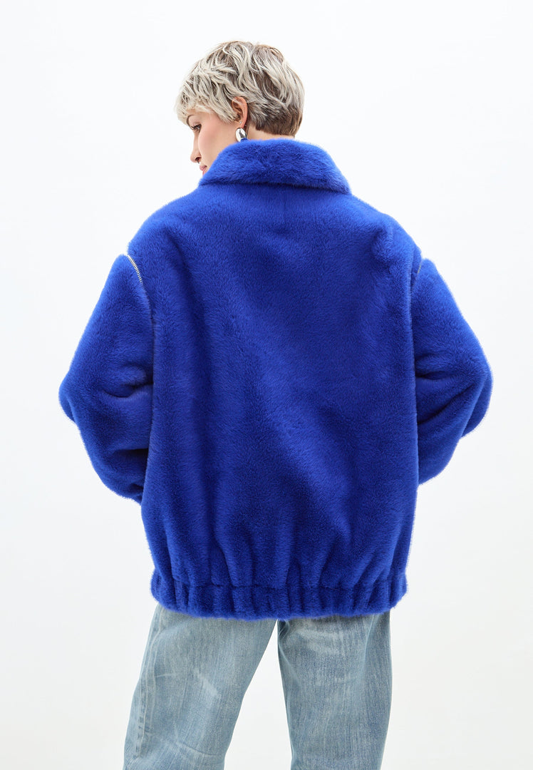 A stylish short blue faux fur coat in Marilyn style, perfect for outerwear fashion.