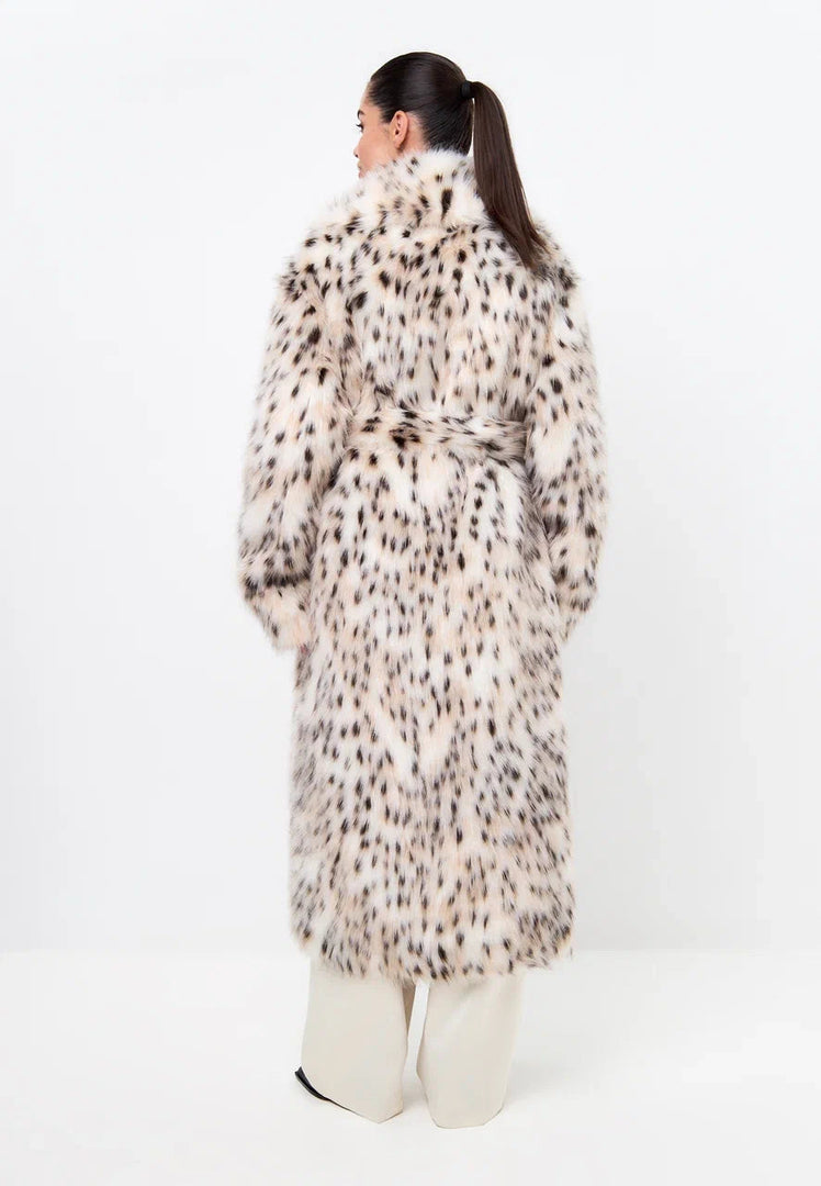 A stylish faux fur long coat with a luxurious spotted print, perfect for winter fashion.