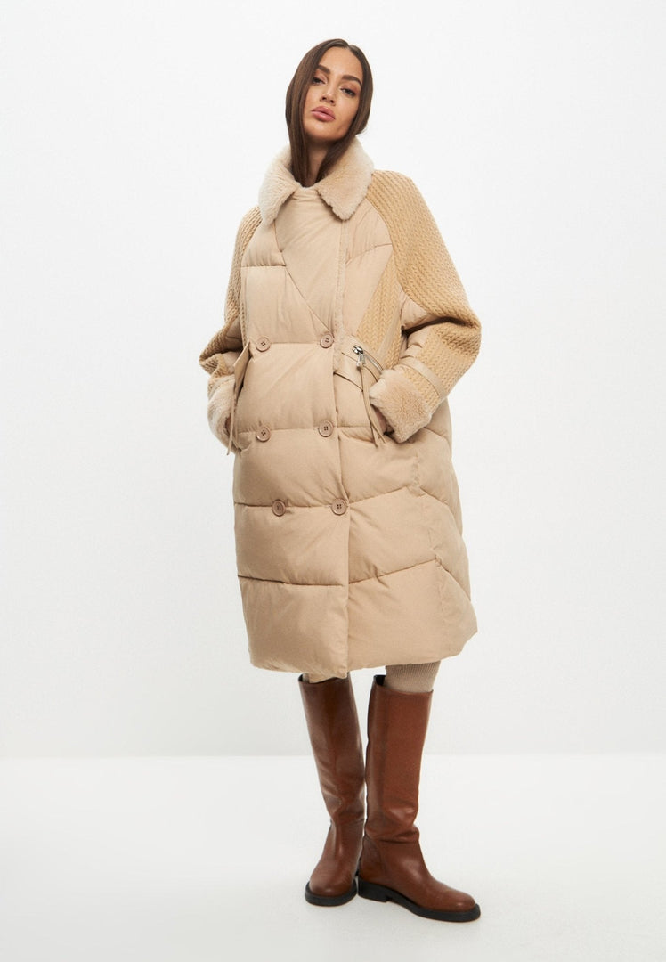A fashionable long quilted beige coat, perfect as a winter jacket, in an oversize style for women's outerwear.