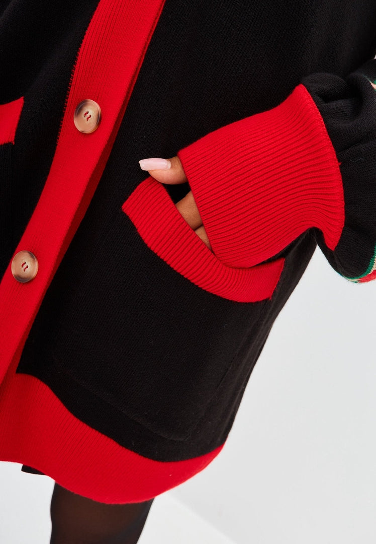 Stay warm and stylish in this cozy chunky knit cardigan with puffy balloon sleeves.