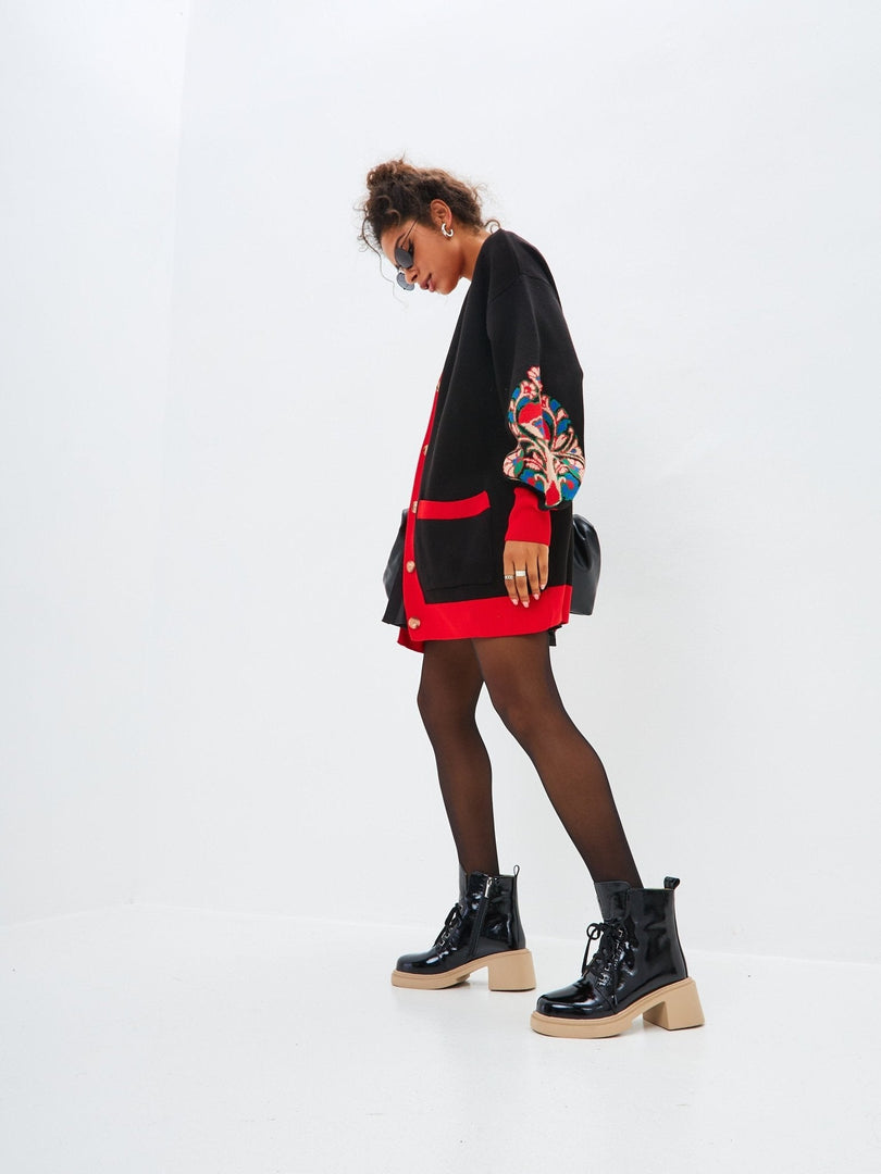 A cozy oversized puffy sleeve chunky knit cardigan perfect for staying warm and stylish on chilly days.