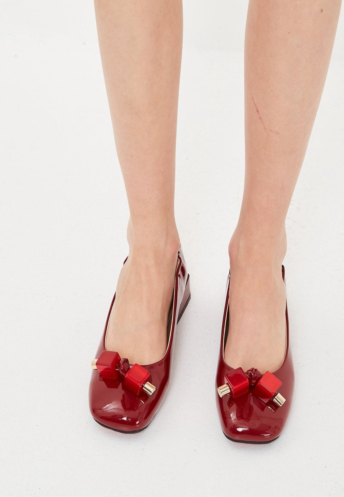 Ballerinor i patenterat läder