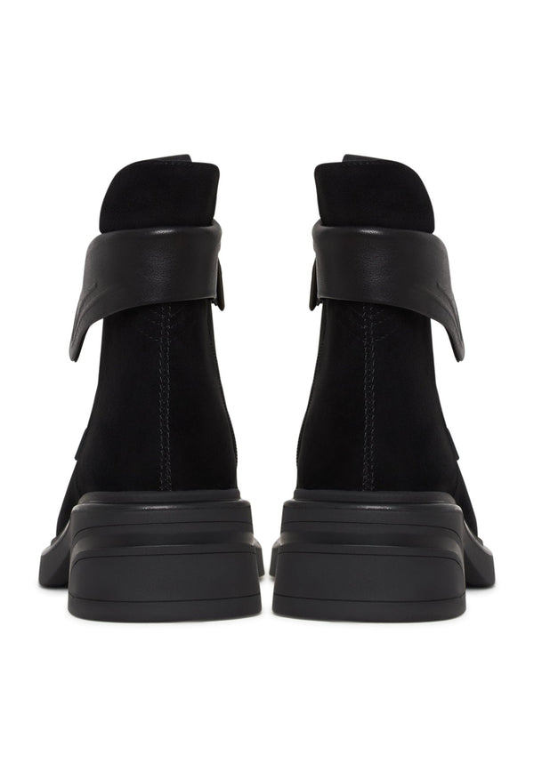 Elegantes botines con tacón en bloque